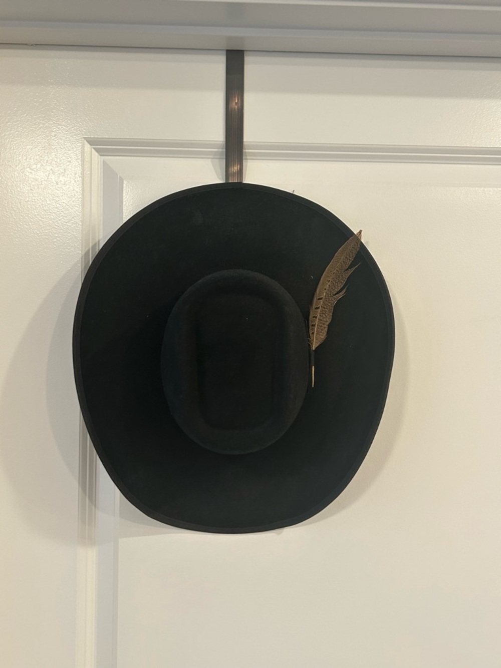 Classic Black Wool Cowboy Hat with Decorative Feather